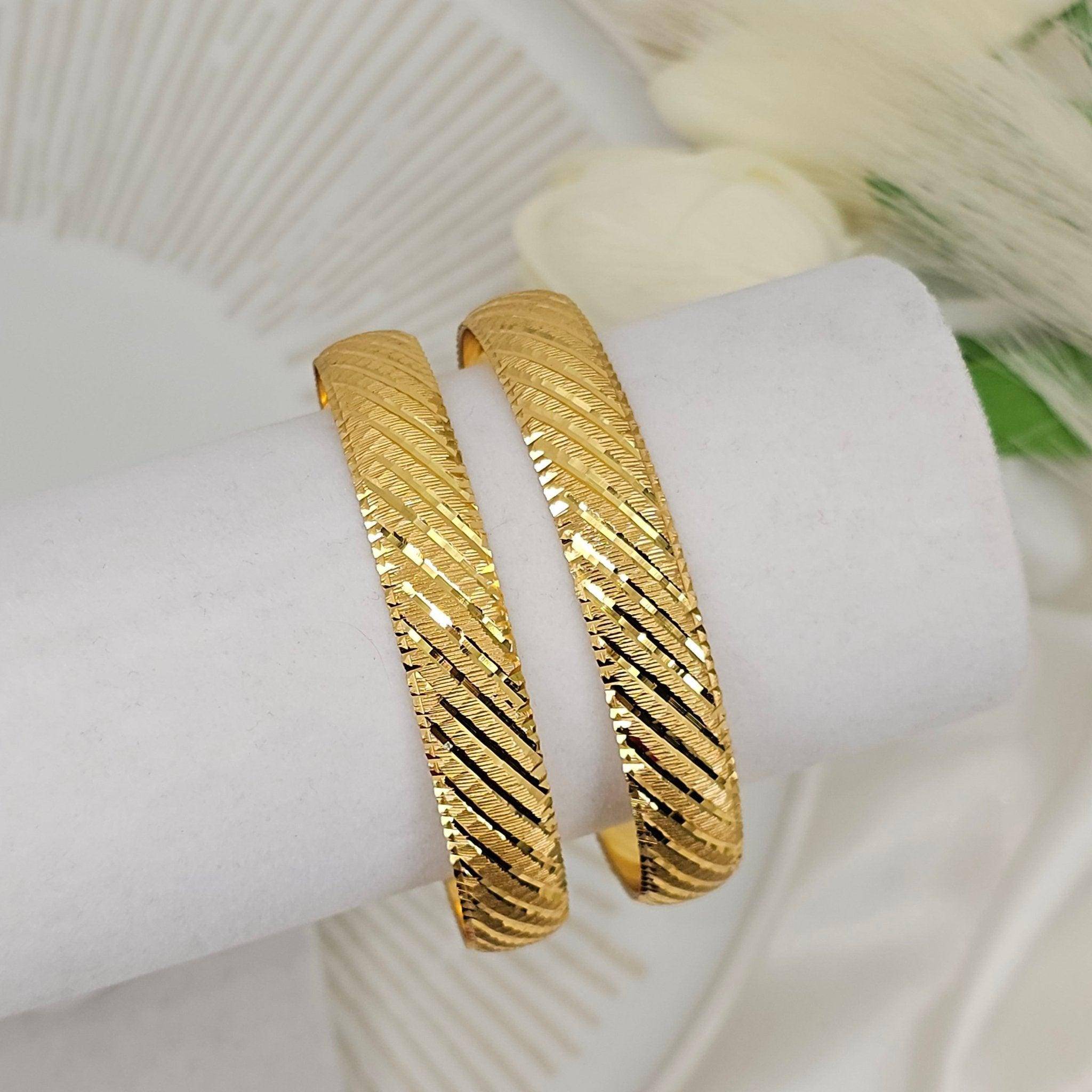 A Pair of Gold Plated Indian Bangles - Fancy Fab Jewels