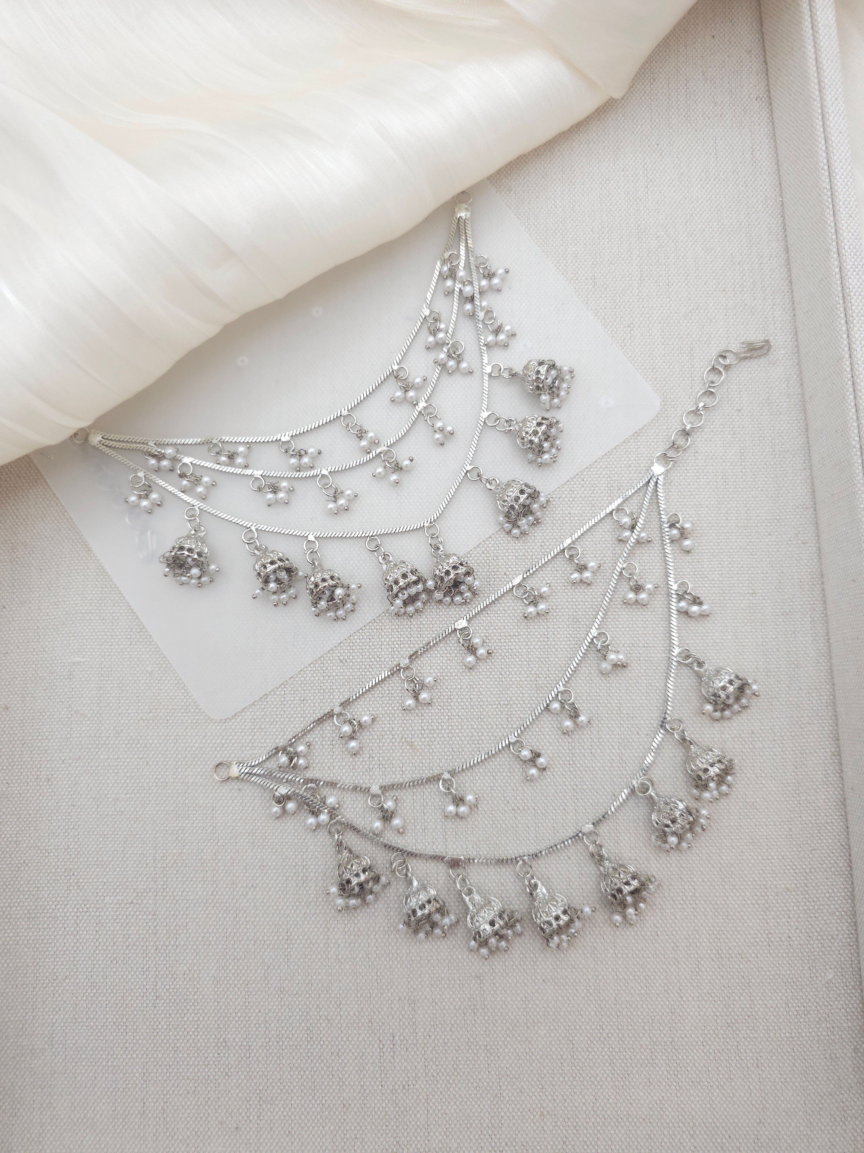 Nazneen: Silver Earring Chains with Bell Drop
